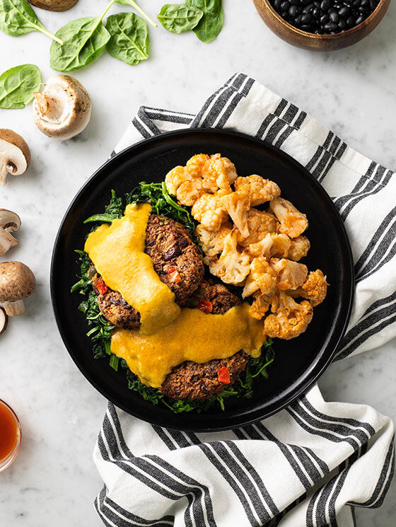 Cheezy Black Bean Sliders with Buffalo Cauliflower
