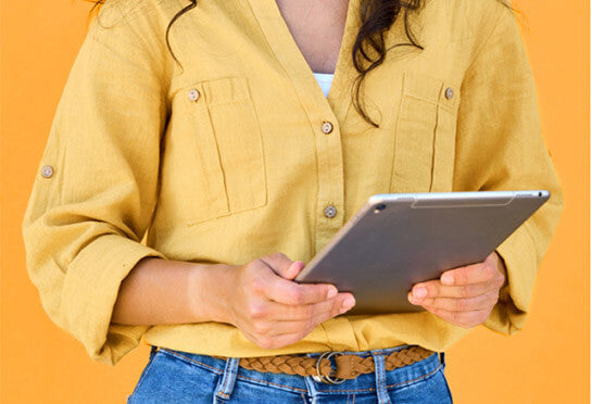 Person holding a tablet