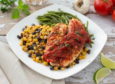 Tilapia with Smokey Tomato Sauce and Black Bean Street Corn